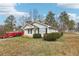 Quaint single-story home with lush front yard landscaping providing a welcoming view at 50 Silver Tip Ct, Mcdonough, GA 30253