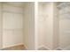 Large walk-in closet with double hanging rods at 5104 Leeshire Se Trl # 64, Atlanta, GA 30339