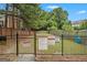 Community pet play area with fence and signage at 5104 Leeshire Se Trl # 64, Atlanta, GA 30339