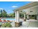 Covered patio area by the community pool, featuring plenty of lounge seating at 5104 Leeshire Se Trl # 64, Atlanta, GA 30339