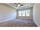 Spacious bedroom with neutral carpeting and large windows at 621 Pineberry Ct, Grayson, GA 30017