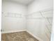 Walk-in closet featuring wire shelving for storage at 621 Pineberry Ct, Grayson, GA 30017