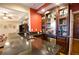 Wet bar with granite countertops, wine glass storage, and a sink for convenient entertaining at 4703 Legacy Cove Ln, Smyrna, GA 30126