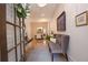 Inviting entryway with bench seating and hardwood floors; view of the dining room at 4703 Legacy Cove Ln, Smyrna, GA 30126