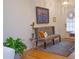Elegant foyer featuring hardwood flooring, bench seating, and decorative accents at 4703 Legacy Cove Ln, Smyrna, GA 30126