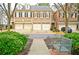 Charming townhome with a well-manicured front yard and inviting entrance at 4703 Legacy Cove Ln, Smyrna, GA 30126