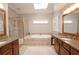 Spacious bathroom featuring a soaking tub, stand-up shower, and double sinks at 4703 Legacy Cove Ln, Smyrna, GA 30126