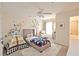 Playful bedroom with safari wall decorations and a themed bed at 4703 Legacy Cove Ln, Smyrna, GA 30126
