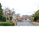 Elegant brick townhomes with a private gated entrance and meticulously landscaped grounds at 4703 Legacy Cove Ln, Smyrna, GA 30126