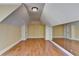 Spacious bonus room with hardwood floors and mirrored wall at 5547 Nelson Pointe Dr, Stone Mountain, GA 30087