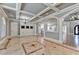 Elegant dining room features a coffered ceiling, detailed trim, and marble flooring at 5547 Nelson Pointe Dr, Stone Mountain, GA 30087