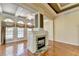 Living room with fireplace and hardwood floors at 5547 Nelson Pointe Dr, Stone Mountain, GA 30087