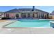 Inviting swimming pool with adjacent patio and home at 5547 Nelson Pointe Dr, Stone Mountain, GA 30087