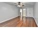 Spacious bedroom with hardwood floors and ceiling fan at 3473 Blanding Ct, Buford, GA 30519