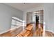 Sunlit dining room features hardwood floors and wainscoting at 3473 Blanding Ct, Buford, GA 30519