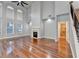 Spacious living room with hardwood floors and fireplace at 3473 Blanding Ct, Buford, GA 30519