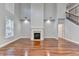 Spacious living room with hardwood floors and fireplace at 3473 Blanding Ct, Buford, GA 30519