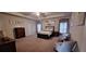 Large bedroom with carpeted floors and a ceiling fan at 6268 Odum Cir, Covington, GA 30014