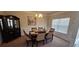 Formal dining room with a chandelier and large window at 6268 Odum Cir, Covington, GA 30014