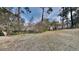 Large backyard with open space and mature trees at 2422 Tiffany Cir, Decatur, GA 30035