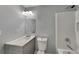 Updated bathroom with vanity and tub at 2422 Tiffany Cir, Decatur, GA 30035