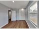 Well-lit bedroom with hardwood floors and built-in closet at 2422 Tiffany Cir, Decatur, GA 30035