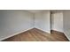 Simple bedroom with hardwood floors and closet at 2422 Tiffany Cir, Decatur, GA 30035