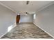 Spacious living room with hardwood floors and ceiling fan at 2422 Tiffany Cir, Decatur, GA 30035