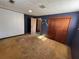 Large basement bedroom with double door closet at 7480 Ambassador Dr, Riverdale, GA 30296