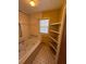 Bathroom with bathtub and built-in shelving at 7480 Ambassador Dr, Riverdale, GA 30296