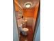 Small bathroom with toilet and pedestal sink at 7480 Ambassador Dr, Riverdale, GA 30296
