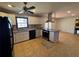 Modern kitchen with granite countertops and stainless steel appliances at 7480 Ambassador Dr, Riverdale, GA 30296