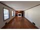 Hardwood floors, built in shelving and fireplace at 7480 Ambassador Dr, Riverdale, GA 30296