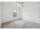 Bedroom with ceiling fan and carpet flooring at 2005 Creek Pointe Way, Villa Rica, GA 30180