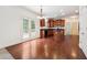 Eat-in kitchen with wood cabinets, granite counters, and stainless steel appliances at 2005 Creek Pointe Way, Villa Rica, GA 30180