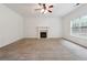 Living room featuring a fireplace and carpet at 2005 Creek Pointe Way, Villa Rica, GA 30180