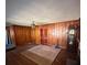 Spacious living area with wood paneled walls at 2104 Cascade Sw Rd, Atlanta, GA 30311