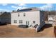 Backyard with a patio, lawn, and solar panels on the roof of the house at 2527 Dayview Ln, Atlanta, GA 30331