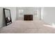 Spacious bedroom featuring neutral walls, plush carpeting, dark wood dresser, and large framed mirror at 2527 Dayview Ln, Atlanta, GA 30331