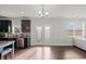 Open kitchen with modern appliances and a view of the dining area at 2527 Dayview Ln, Atlanta, GA 30331