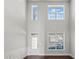 Bright living room boasts soaring ceilings, large windows, and elegant trim work at 2527 Dayview Ln, Atlanta, GA 30331