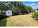 Backyard with shed and expansive grassy area at 117 Javay Ct, Villa Rica, GA 30180