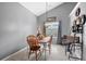 Charming dining room featuring a wood table and four chairs at 117 Javay Ct, Villa Rica, GA 30180