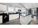 Modern kitchen with white cabinets, granite countertops, and island at 117 Javay Ct, Villa Rica, GA 30180