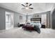 Spacious main bedroom with a king-size bed and ensuite bathroom at 117 Javay Ct, Villa Rica, GA 30180