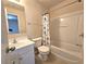 Full bathroom featuring a tub and shower combo, toilet and vanity with sink at 2192 Landing Walk Dr, Duluth, GA 30097