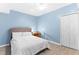 Basement bedroom with light blue walls and a ceiling fan at 6519 Cheval Ct, Stone Mountain, GA 30087