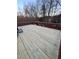 Newly refinished wooden deck perfect for outdoor entertaining at 6519 Cheval Ct, Stone Mountain, GA 30087