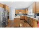 Kitchen with stainless steel appliances and an island at 6519 Cheval Ct, Stone Mountain, GA 30087