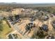 Aerial view of community with houses and landscape at 6610 Wesley Trail Holw, Cumming, GA 30028